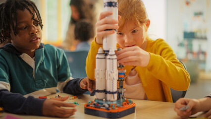 Smart Boys and Talented Girls Making a Model of a Modern Multiplanetary Space Rocket. Young Gifted...