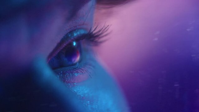 Side extreme close up of spacewomans eye observing mesmerizing space beauty with enjoyment