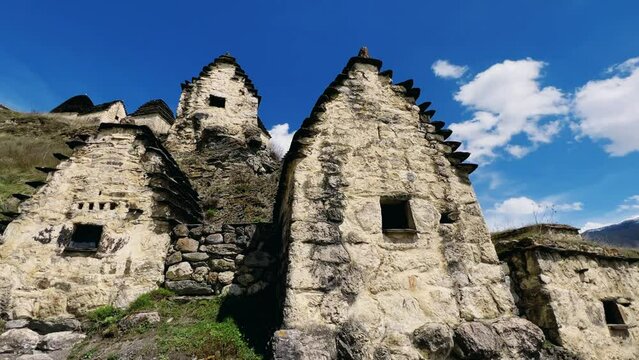 Dargavs is a unique city of the dead in North Ossetia. There are many houses and a crypt-tomb on the top of the rocky mountains. The City of the Dead on the mountainside near the Midagrabindon River. 