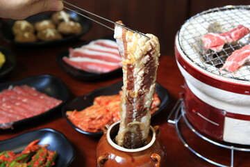 Yakiniku, Japanese style grilled meat in a ceramic jar.