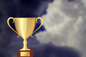 Golden winner cup award on sky background