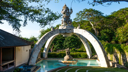 BALI APRIL 2024 - God sculpture in a fountain in Bali Pura Luhur Uluwatu Tempel, Uluwatu and...