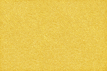 surface and texture of fine mix size gravel gold wall background