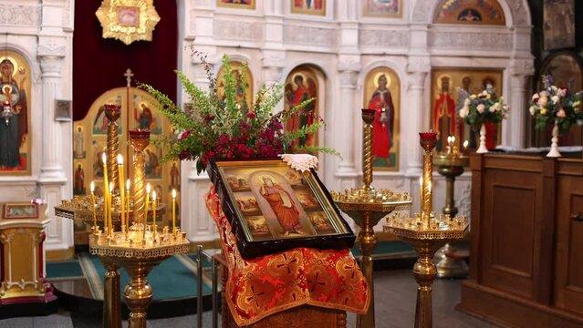 interior of the Orthodox church with icons and candles
