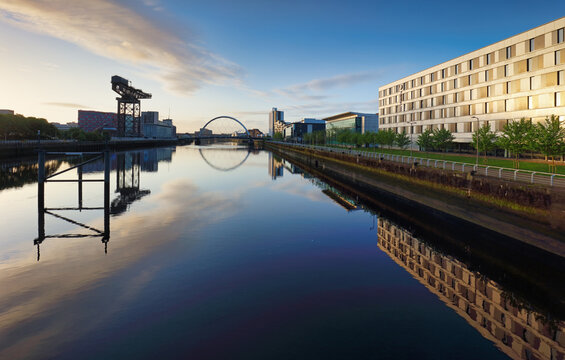 Glasgow panorama at dramatic sunrise with Clyde river, Scotland
