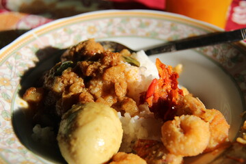 Chicken satay with hard-boiled egg along with. suitable for the traditional cuisine theme.