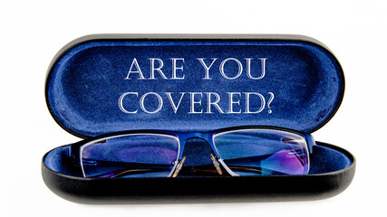 ARE YOU COVERED text written on an open case with eyeglasses - obrazy, fototapety, plakaty