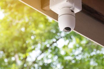 ip cctv camera which homeowner installed on high ceiling of the house to do the security instead of human at home, soft focus.