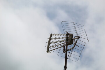 Outdoor antenna for analog television with clear sky in the morning in the background