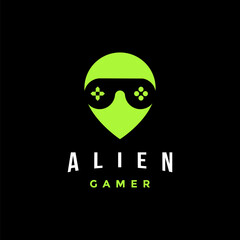 Alien gamer head with joystick as glasseye logo icon vector template on black background © DOMHOUZE