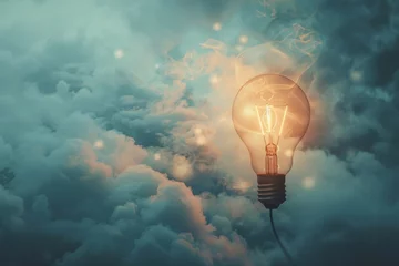 Fototapeten Glowing lightbulb rising amongst moody clouds, conceptualizing a great idea and the path to success © alphaspirit