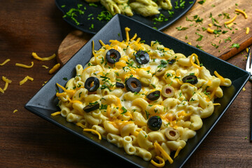 Mac and Cheese; Special recipe of macaroni with a mix of assorted cheese, selected seasoning, whole...