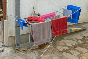 Colourful Towels Portable Drying Rack at Street