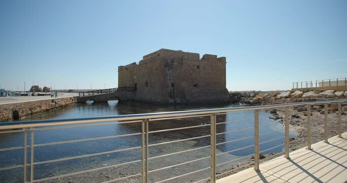 A fort in the pathos of Cyprus. An old building on the shore of the Mediterranean Sea in an urban landscape. High quality 4k footage