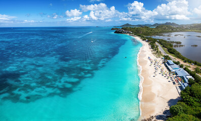 Aerial view of the beautiful Darkwood Beach at the Caribbean island of Antigua with turquoise sea...