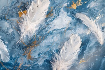 Elegantly arranged feathers on a blue marble background with golden accents