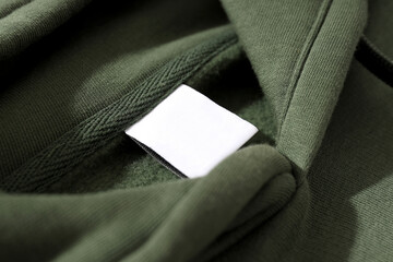 Warm stylish clothes with blank white label