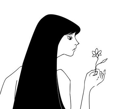 手に持つ一輪の花を見つめる女性　