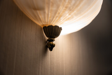 Included wall light. Wall lamp close-up.