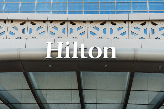 Hilton hotels and resorts logo on the building.