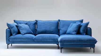 Eco-friendly, space-saving blue corner sofa that transitions seamlessly from seating to sleeping, in a minimalist setting on an isolated background