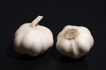 Garlic on a black background close-up. Organic garlic, Food background - 792632575