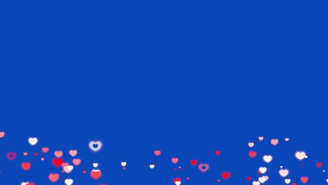Particles of hearts jumping blue screen effect