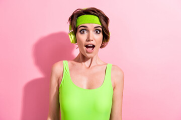 Photo of surprised coach trainer listen motivation plylist for doing sport isolated pastel color background