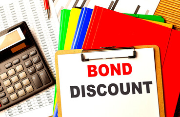 BOND DISCOUNT text on clipboard with calculator and color folder