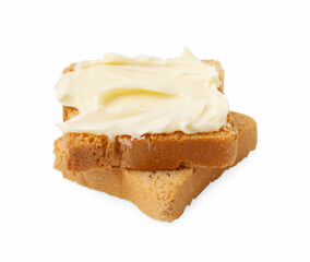 Slices of dry bread with butter isolated on white