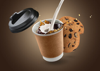Pouring fresh milk into cup of coffee and chocolate chip cookies in air on brown gradient background