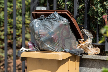 April 18, 2024 - Paris, France - Overflowing Trash Cans in Paris, France: Urban Waste and...