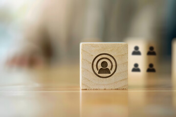 Wooden blocks stacked with target icon: customer relationship management concept 