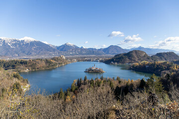 Fototapeta na wymiar Winter Landscape, Lake Bled, and behind it the Alps mountains.View from above