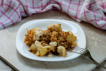 Cauliflower casserole served on a plate.