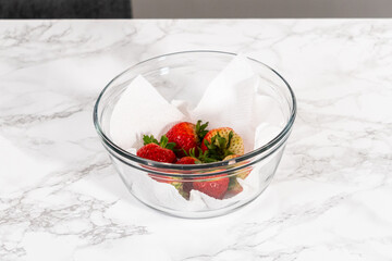 Washed and Dried Strawberries Neatly Stored in a Glass Bowl - 792718513