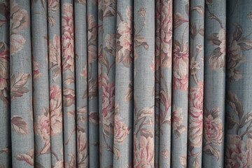 ocean blue fabric with pink flowers in full bloom 