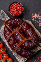 Delicious black blood sausage or black pudding with spices and herbs