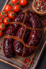 Delicious black blood sausage or black pudding with spices and herbs