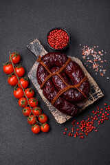 Delicious black blood sausage or black pudding with spices and herbs