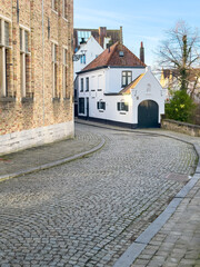 Street view of the famous touristic city of Belgium, Bruge, and its houses with classical medieval architecture