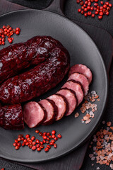 Delicious black blood sausage or black pudding with spices and herbs