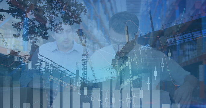 Image of financial graphs over caucasian male warehouse workers