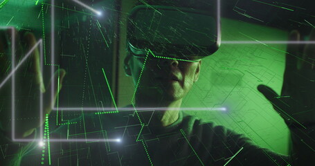 Image of data over male it engineer with vr headset by computer server