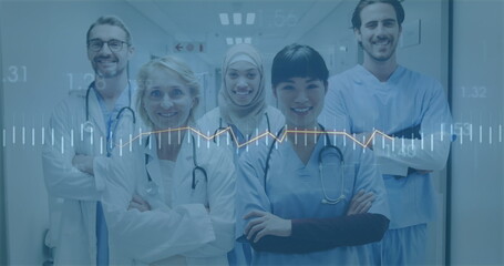 Image of financial data processing over diverse doctors at hospital