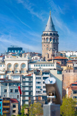 Galata Tower stands tall amidst urban skyline of Istanbul, Turkey