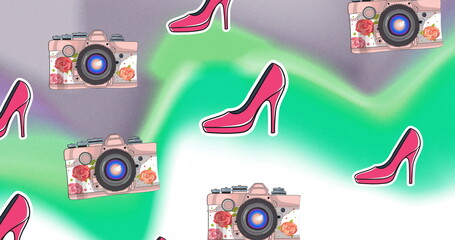 Image of pink shoes and cameras on colourful background
