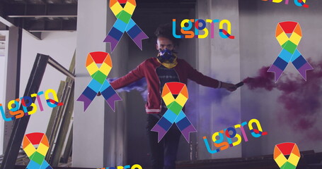 Image of lgbtq and rainbow ribbons over african american male protester with smoke - obrazy, fototapety, plakaty
