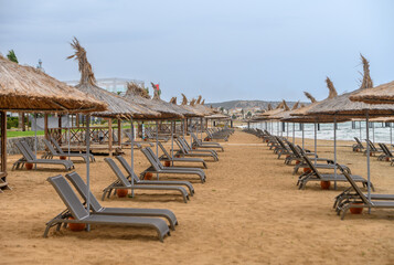 beachgoers with umbrellas on the beach of the Mediterranean Sea 4