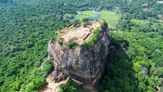 Aerial drone landscape of ancient rock mountain fortress with ruins Sigiriya in Dambulla Sri Lanka travel tourism Asia UNESCO World Heritage Archaeology